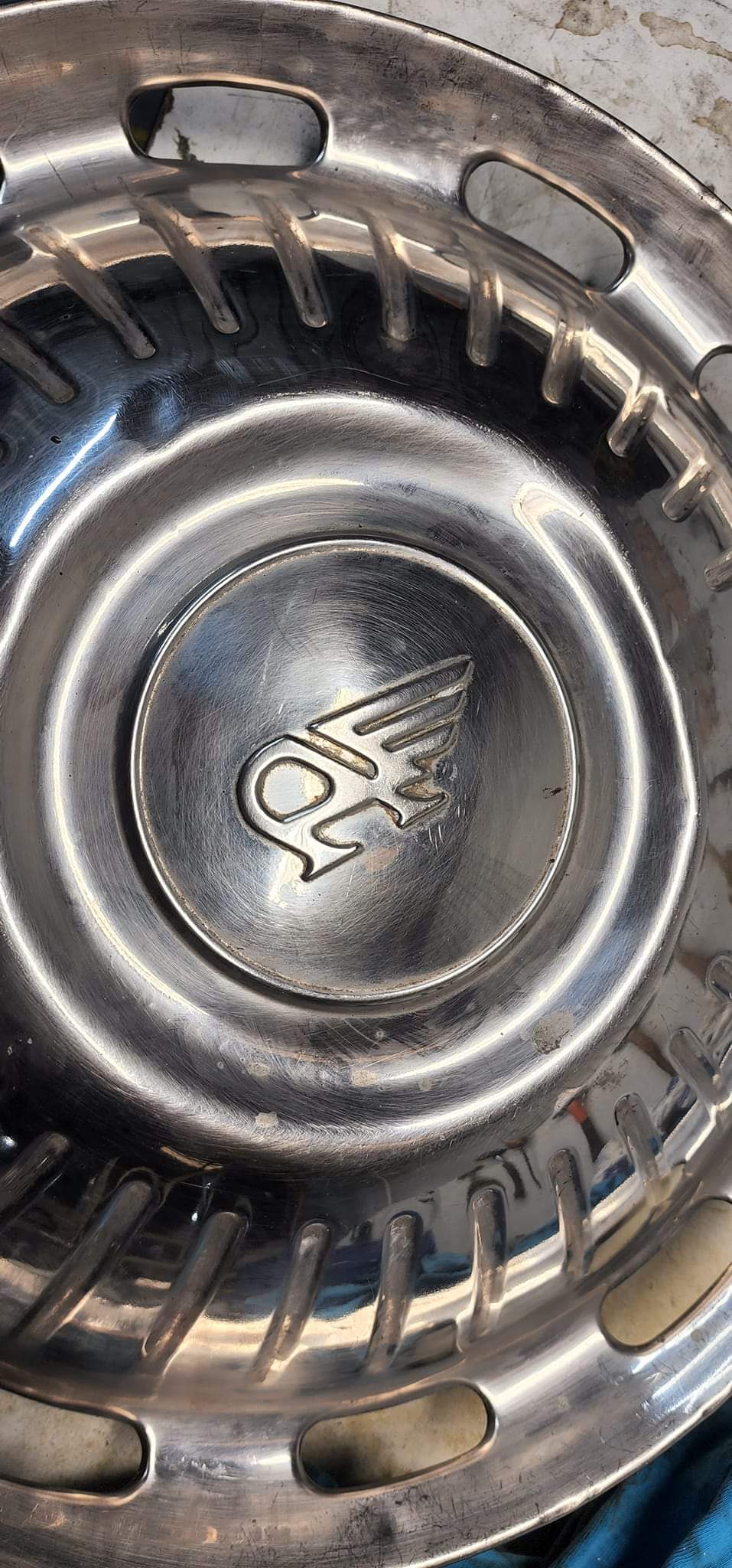 Car restoration workshop during metal polishing